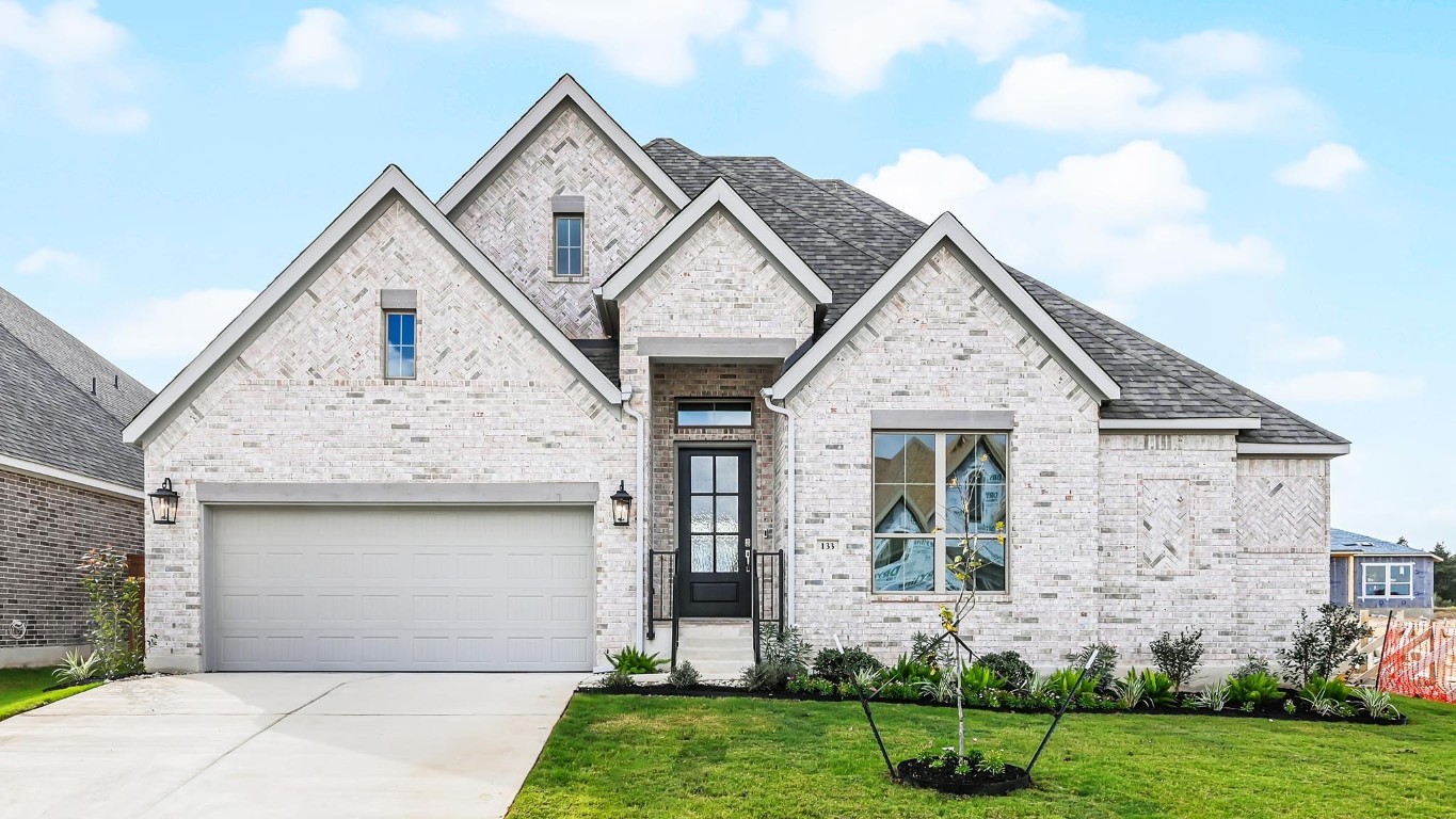 a front view of house with yard