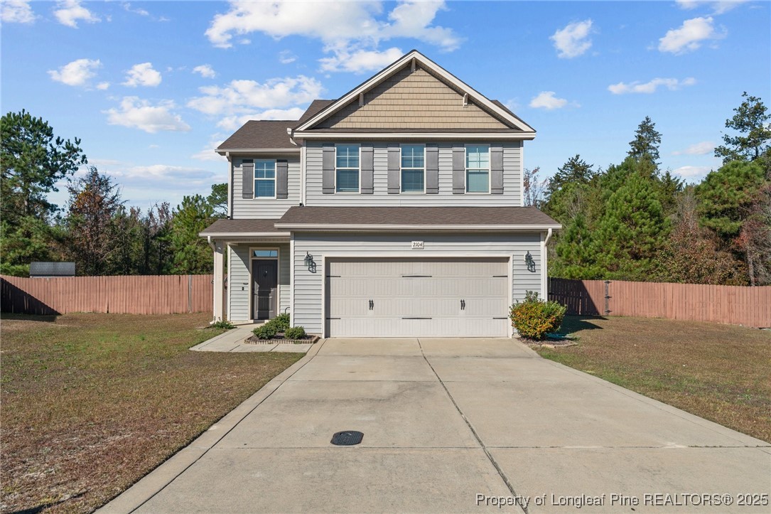 a front view of a house with yard