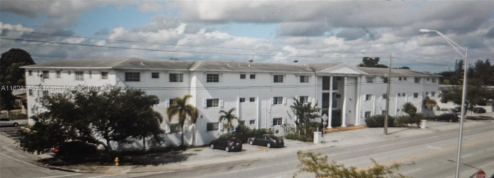 a view of multiple house with a pathway