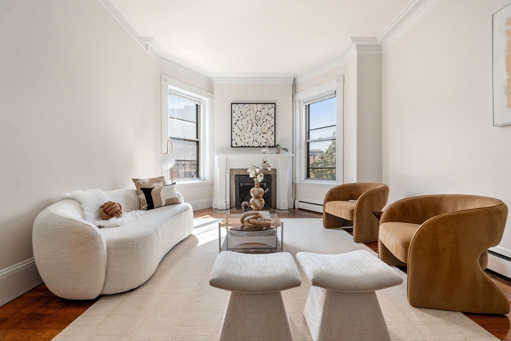 a living room with furniture or couch and a window