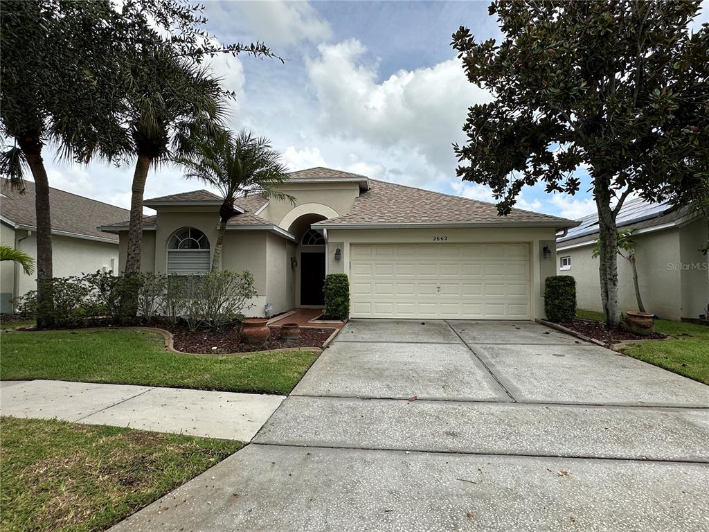 front view of house with a yard