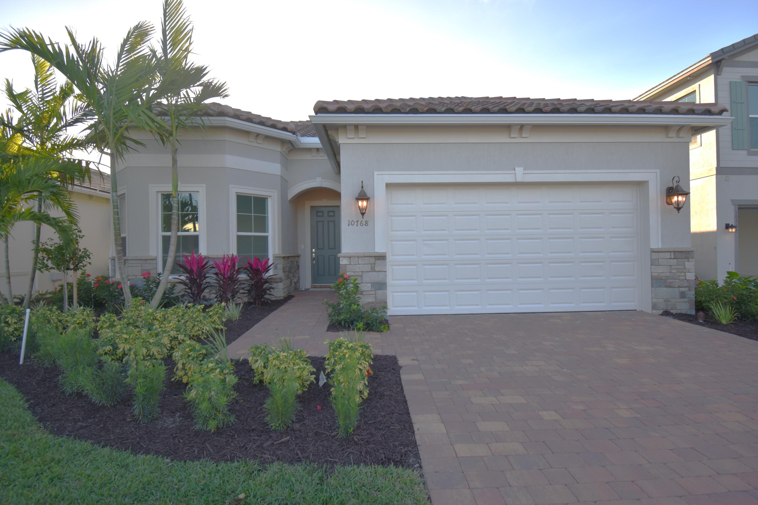 front view of a house with a street