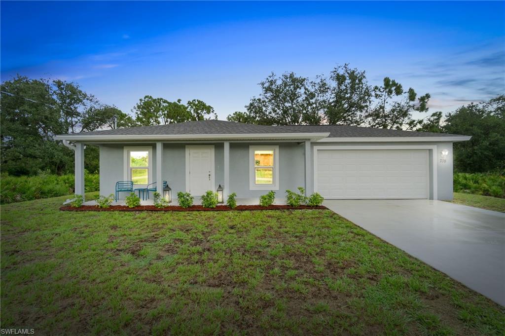 front view of house with a yard