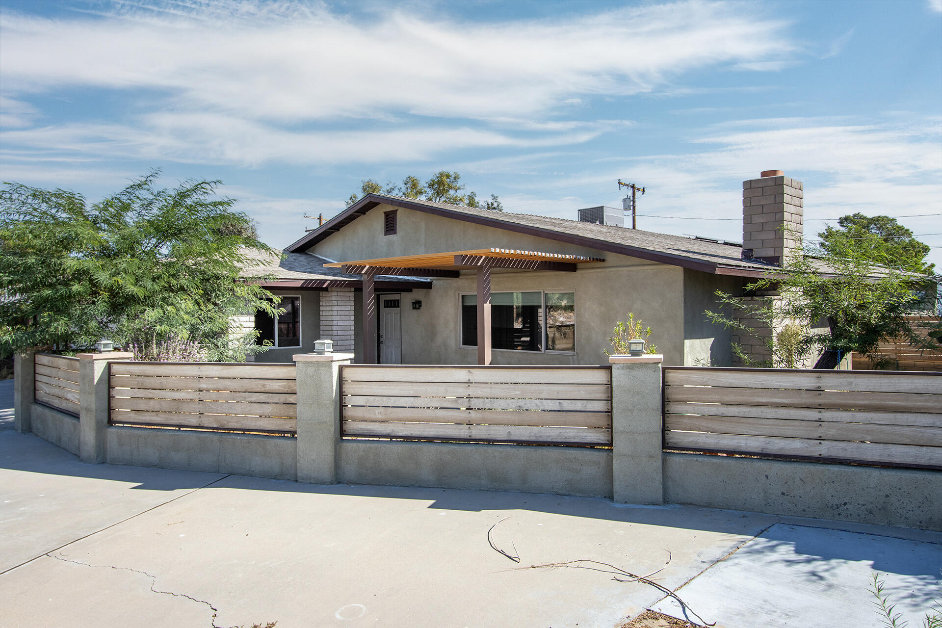 a view of house with outdoor space and sitting space