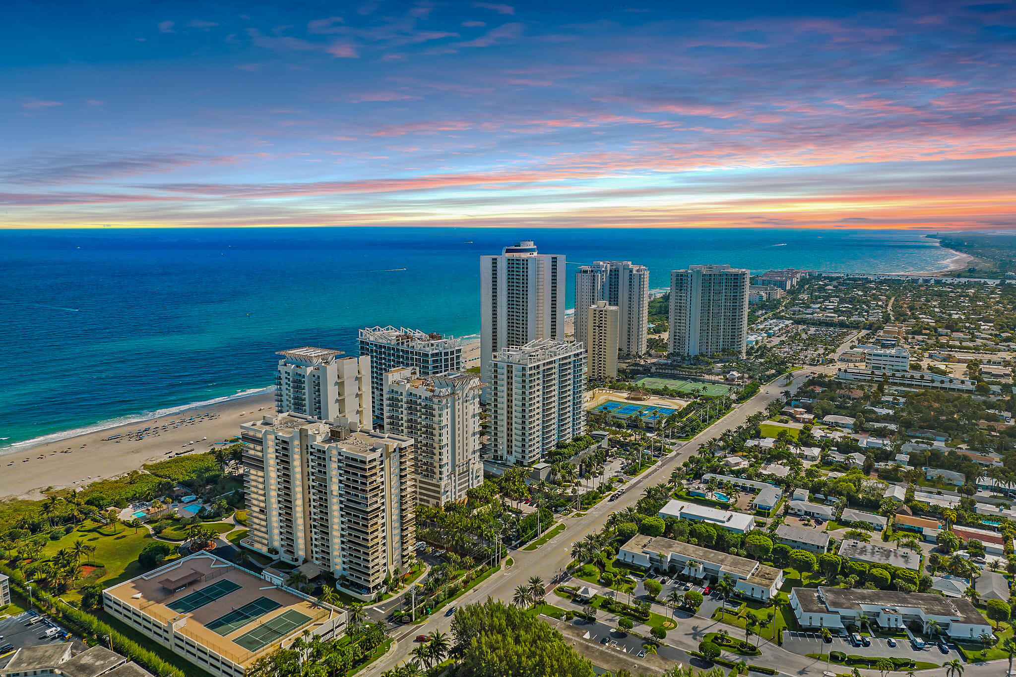 a view of a city with ocean