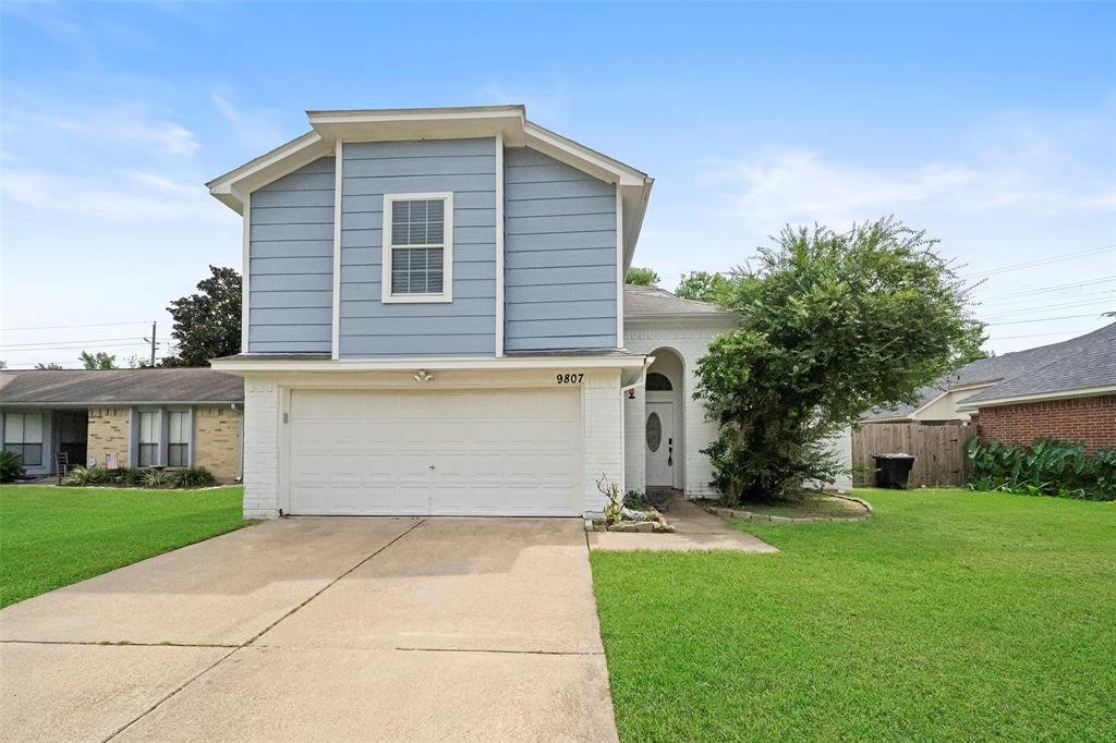 a front view of house with yard