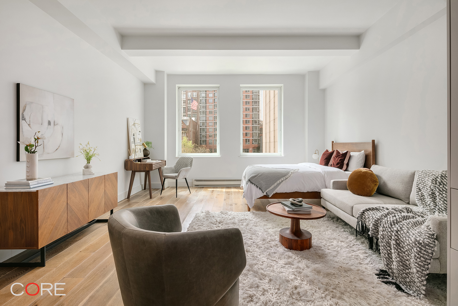 a living room with furniture window and a couch