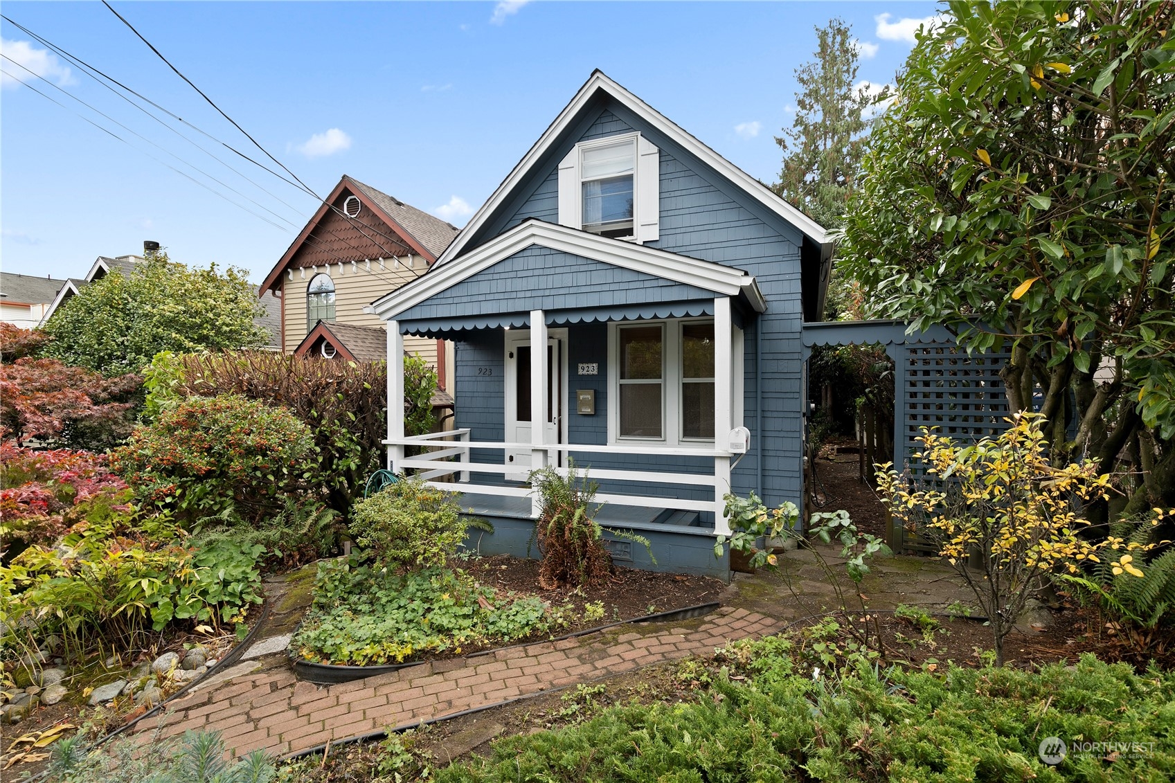 a house view with a garden space