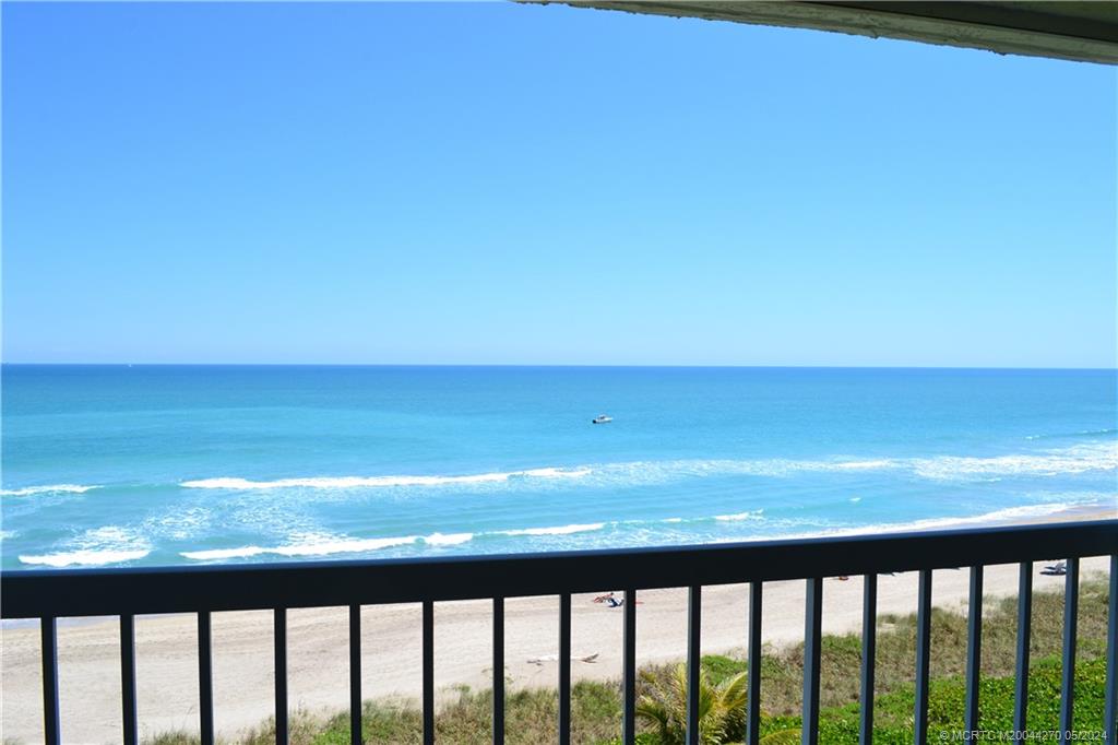 a view of ocean from a balcony