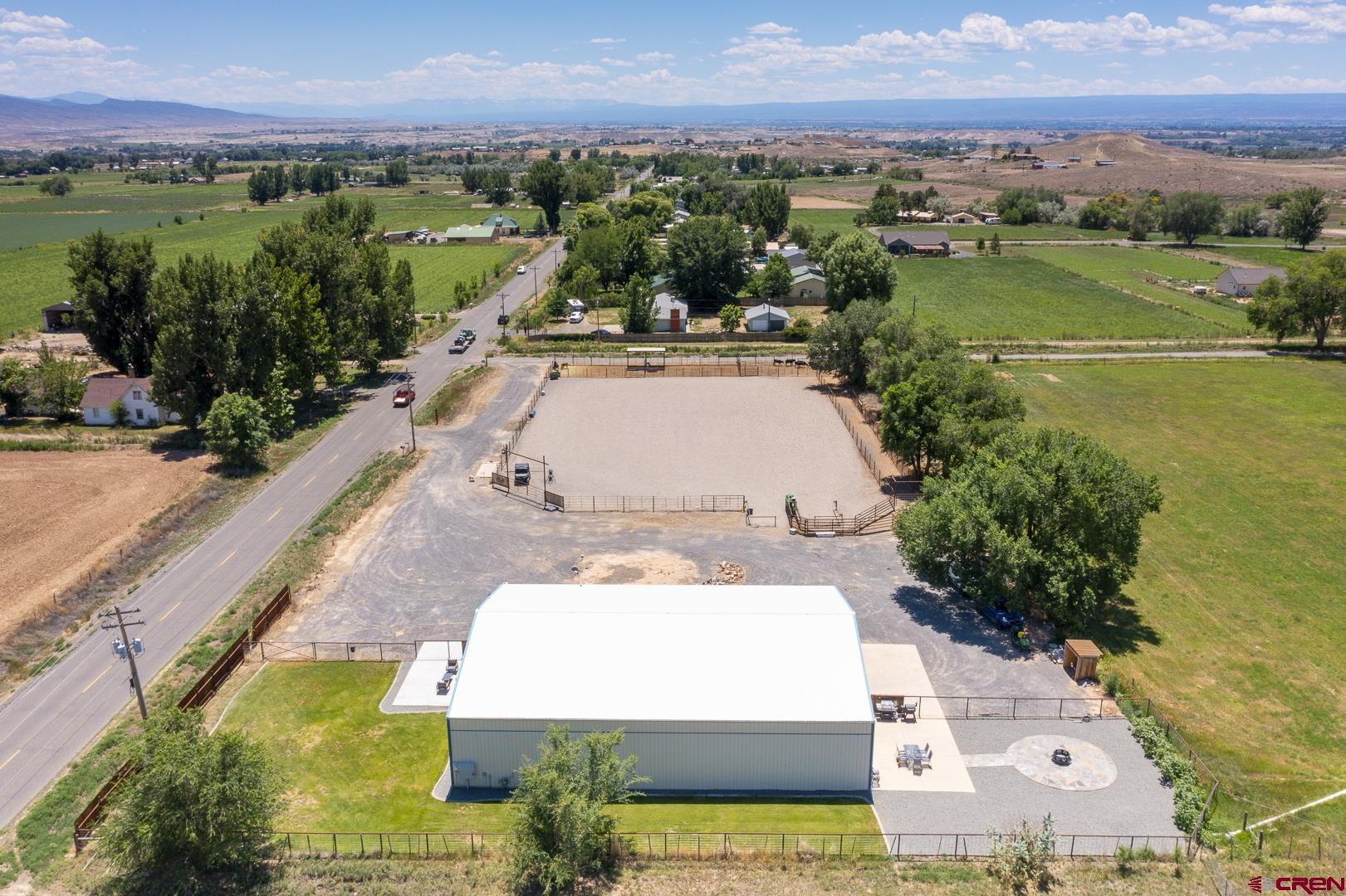 an aerial view of a house with a garden