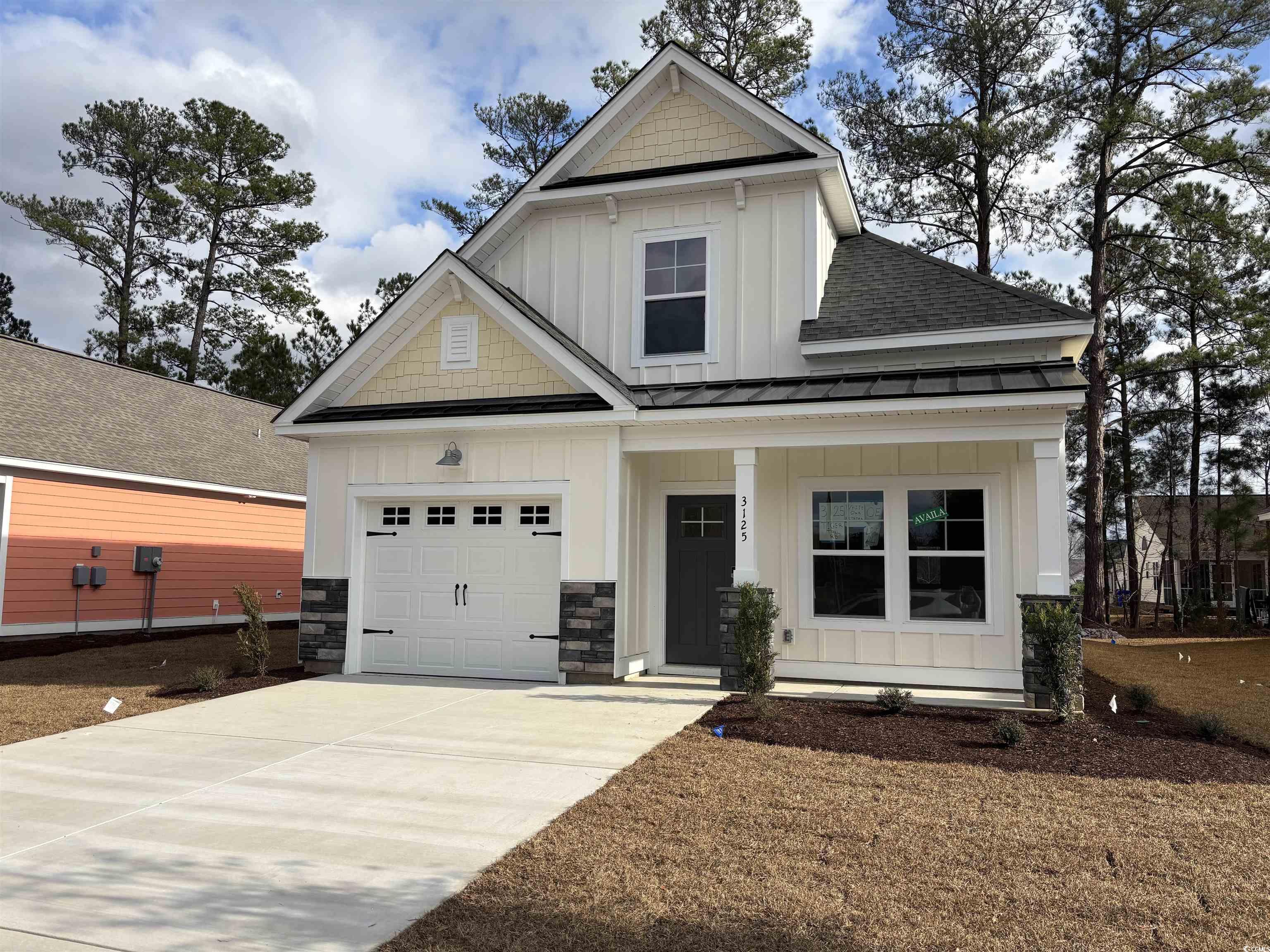 Craftsman house with a garage