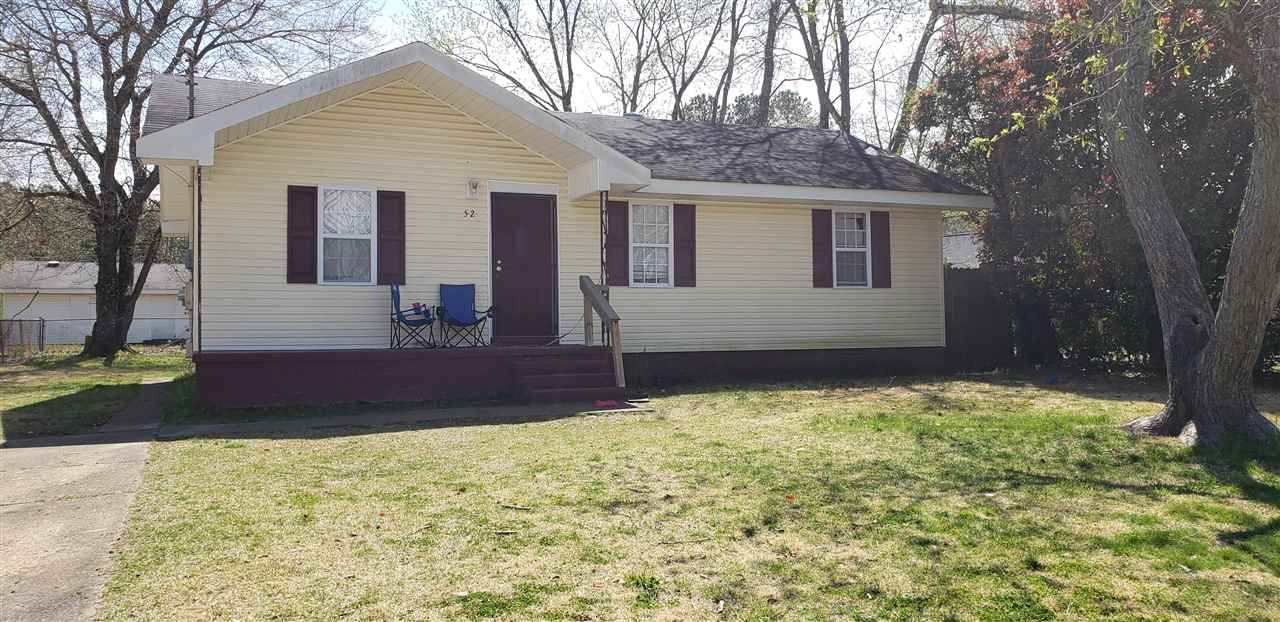 a front view of house with yard