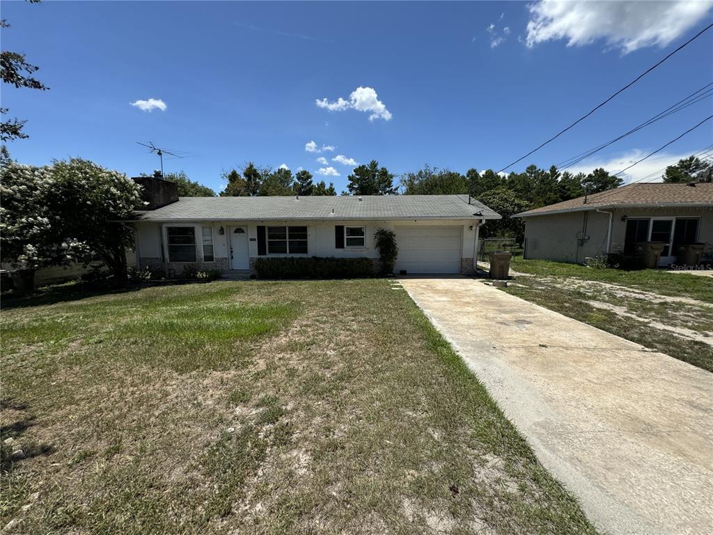 a view of a house with a patio