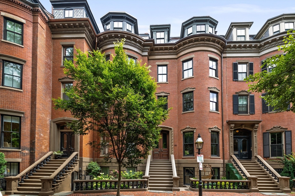 a front view of a multi story residential apartment building