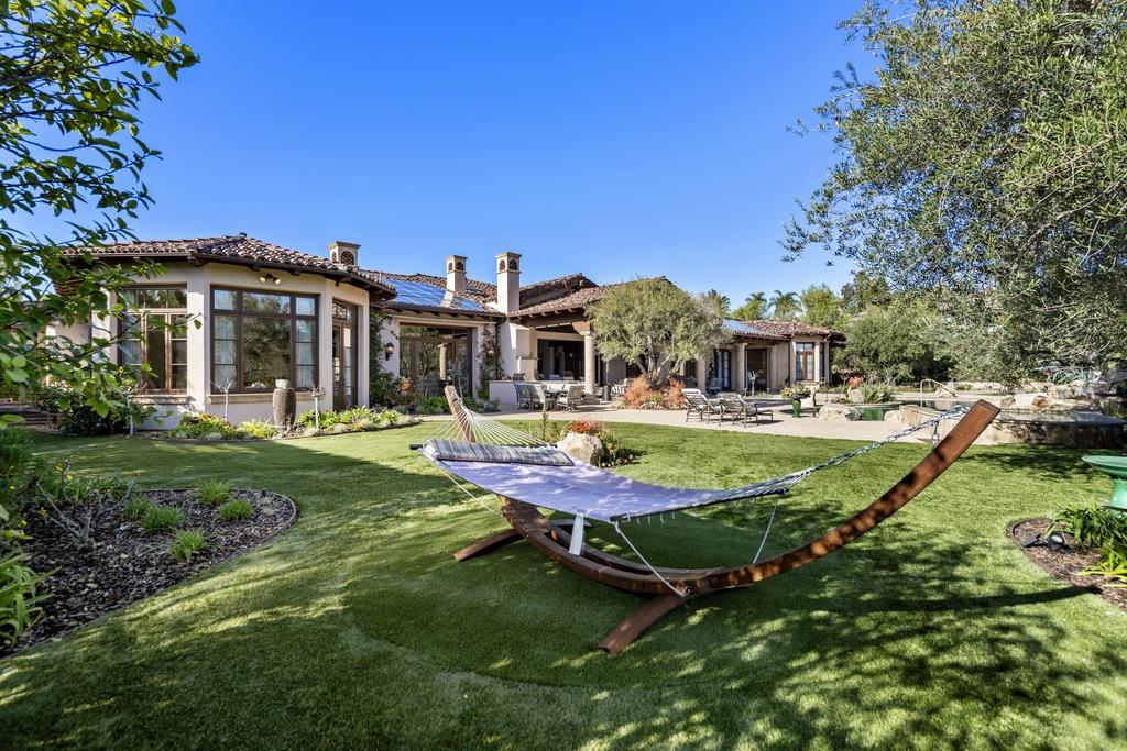 a view of a house with a swimming pool