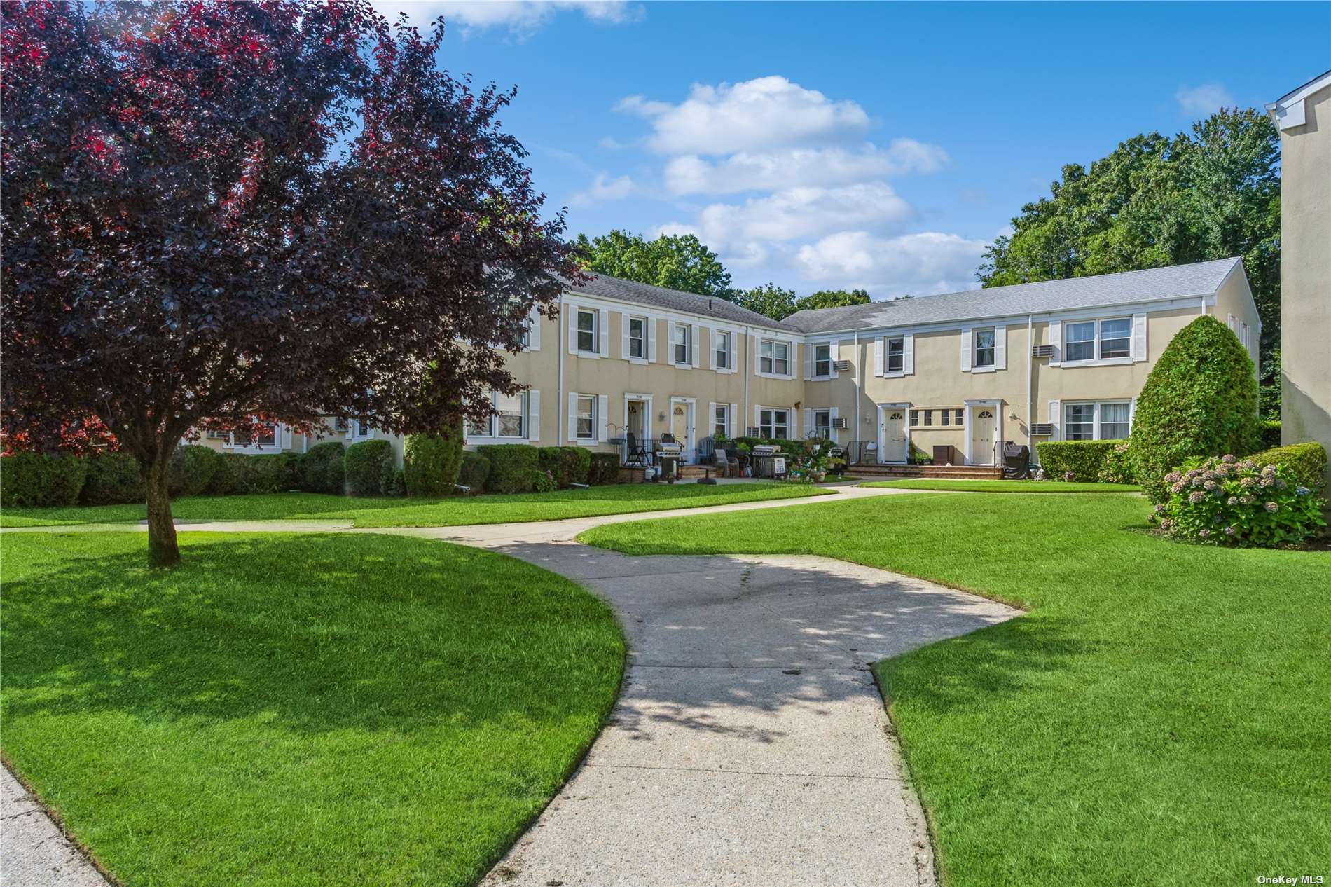 a view of a house with a big yard