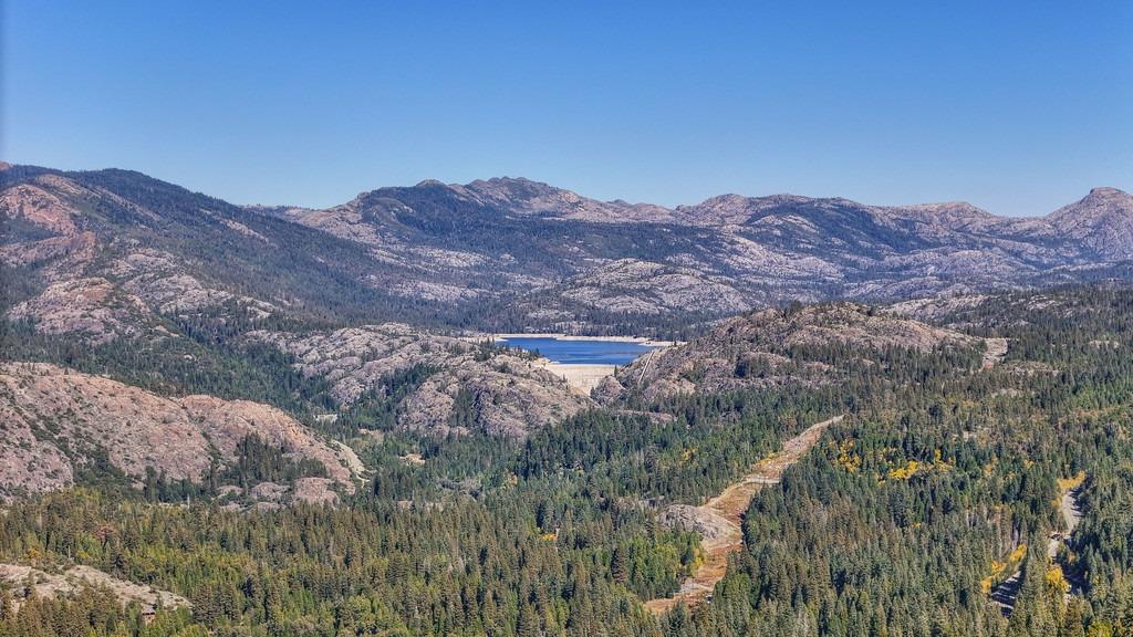 a view of mountains and valleys