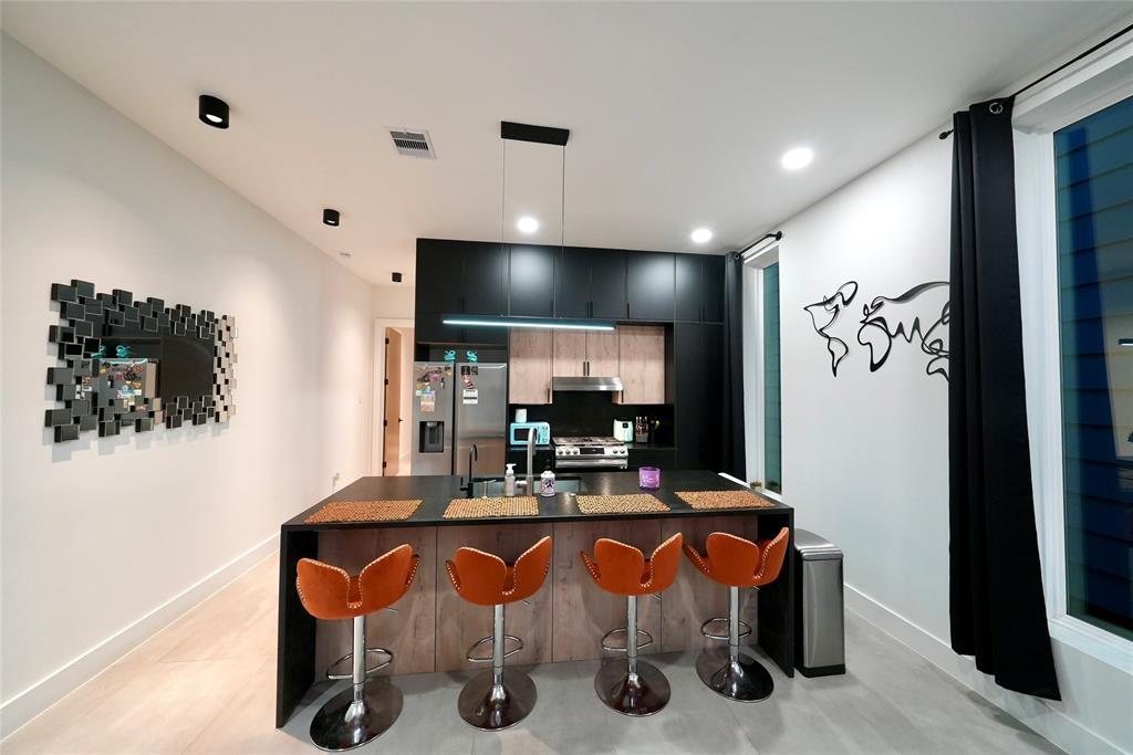 a view of a dining room with furniture