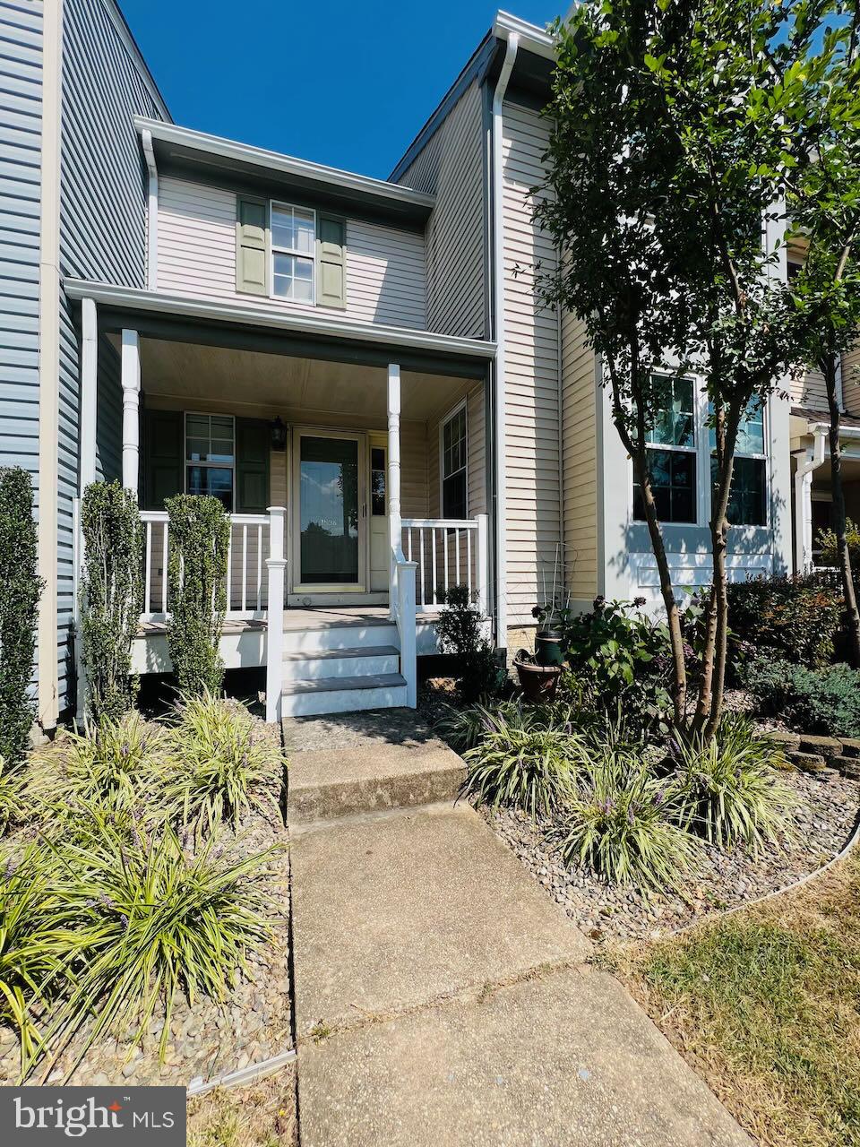 front view of a house with a patio