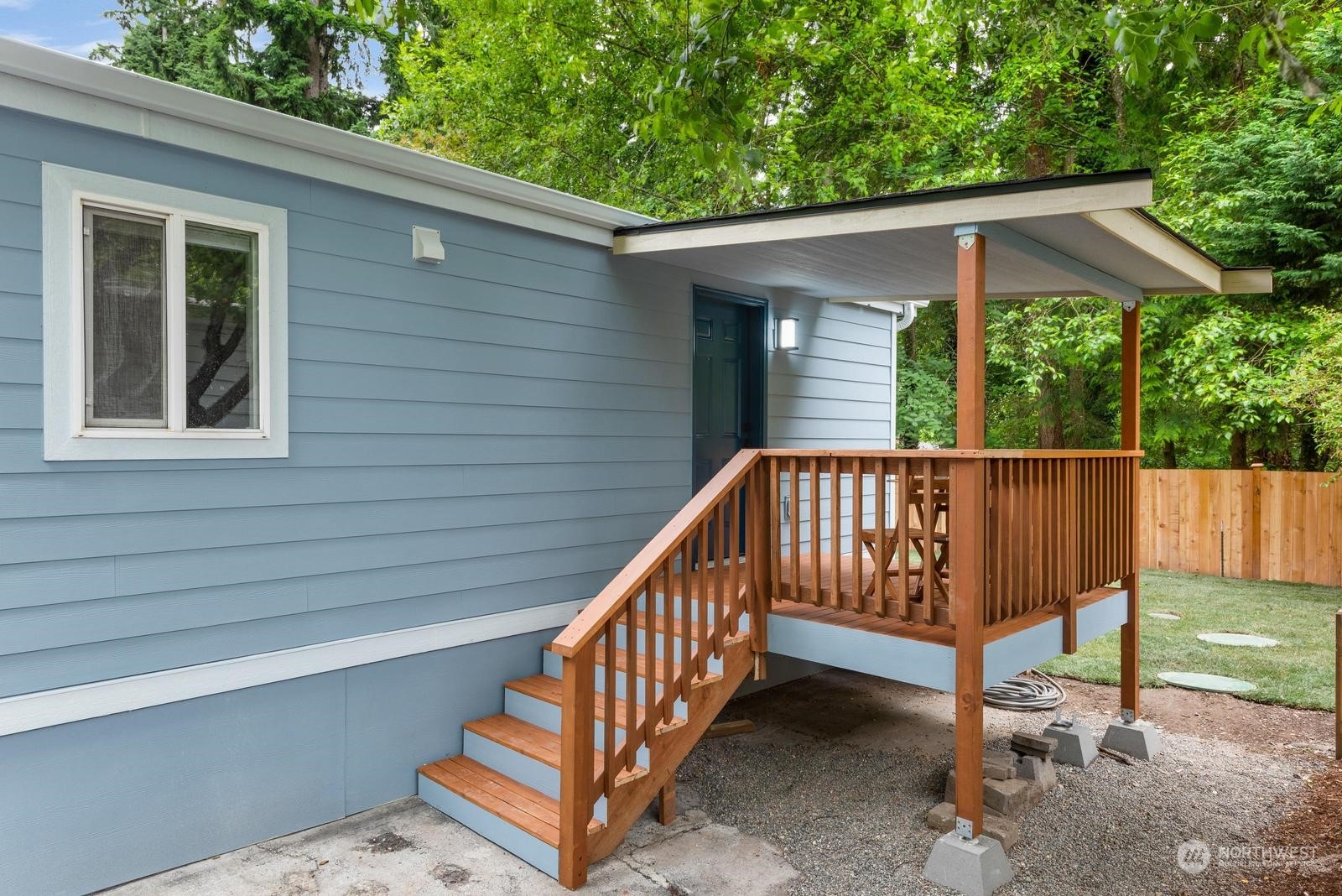 a view of outdoor space with deck and yard