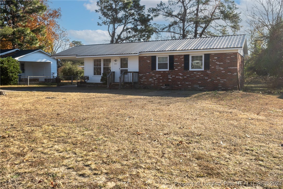 front view of house with a yard