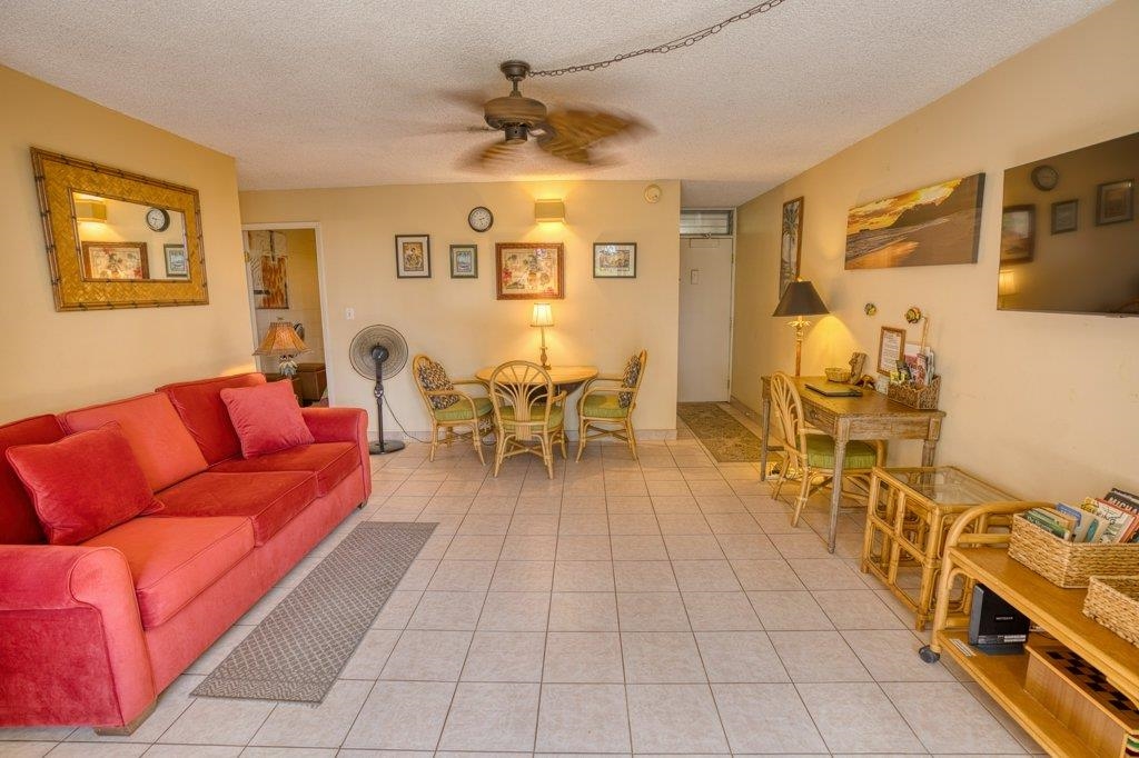 a living room with furniture and a view of living room