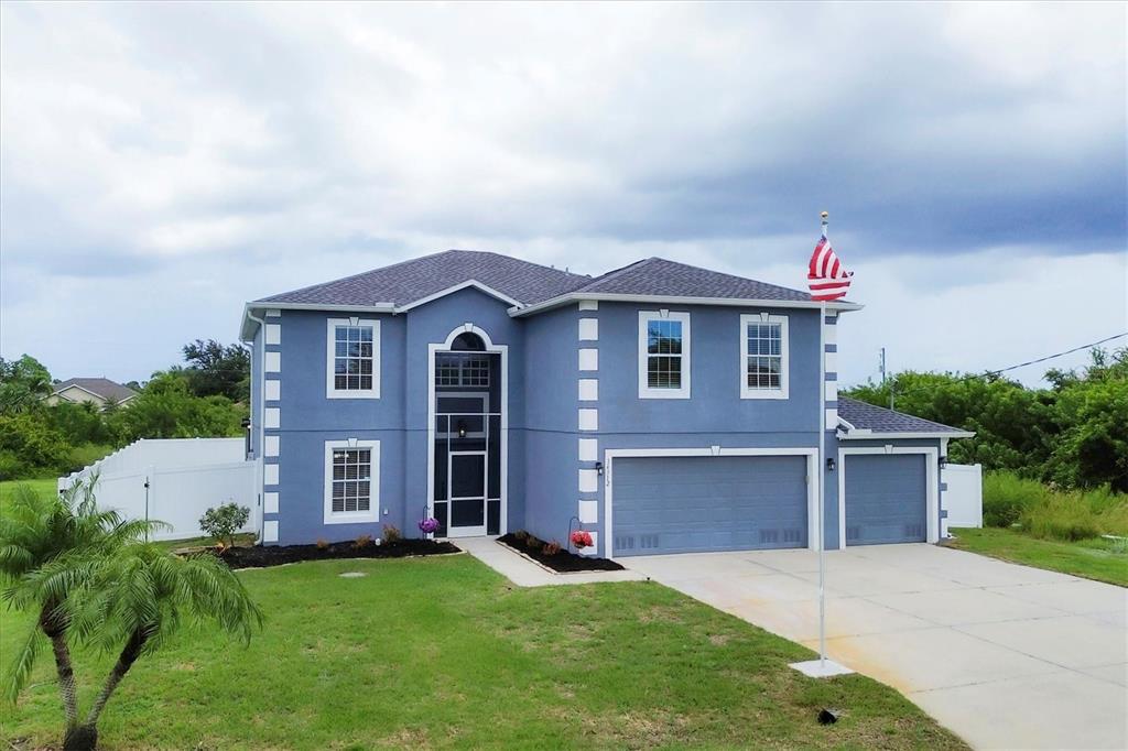 front view of a house with a yard