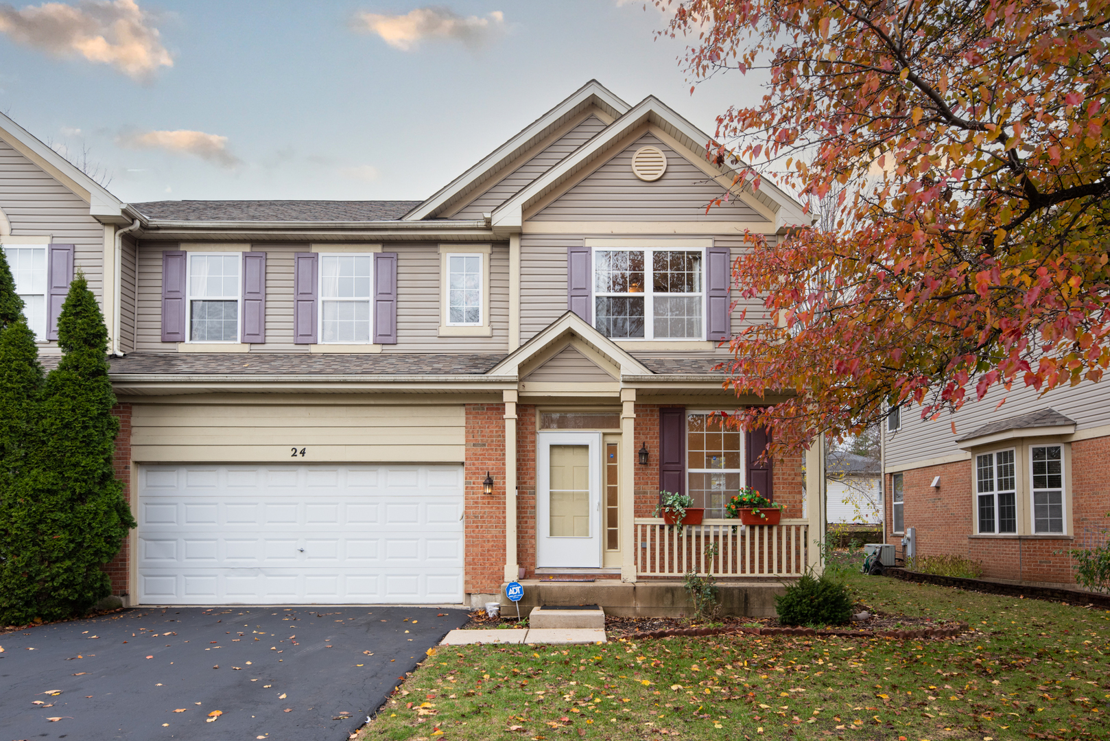 front view of a house with a yard