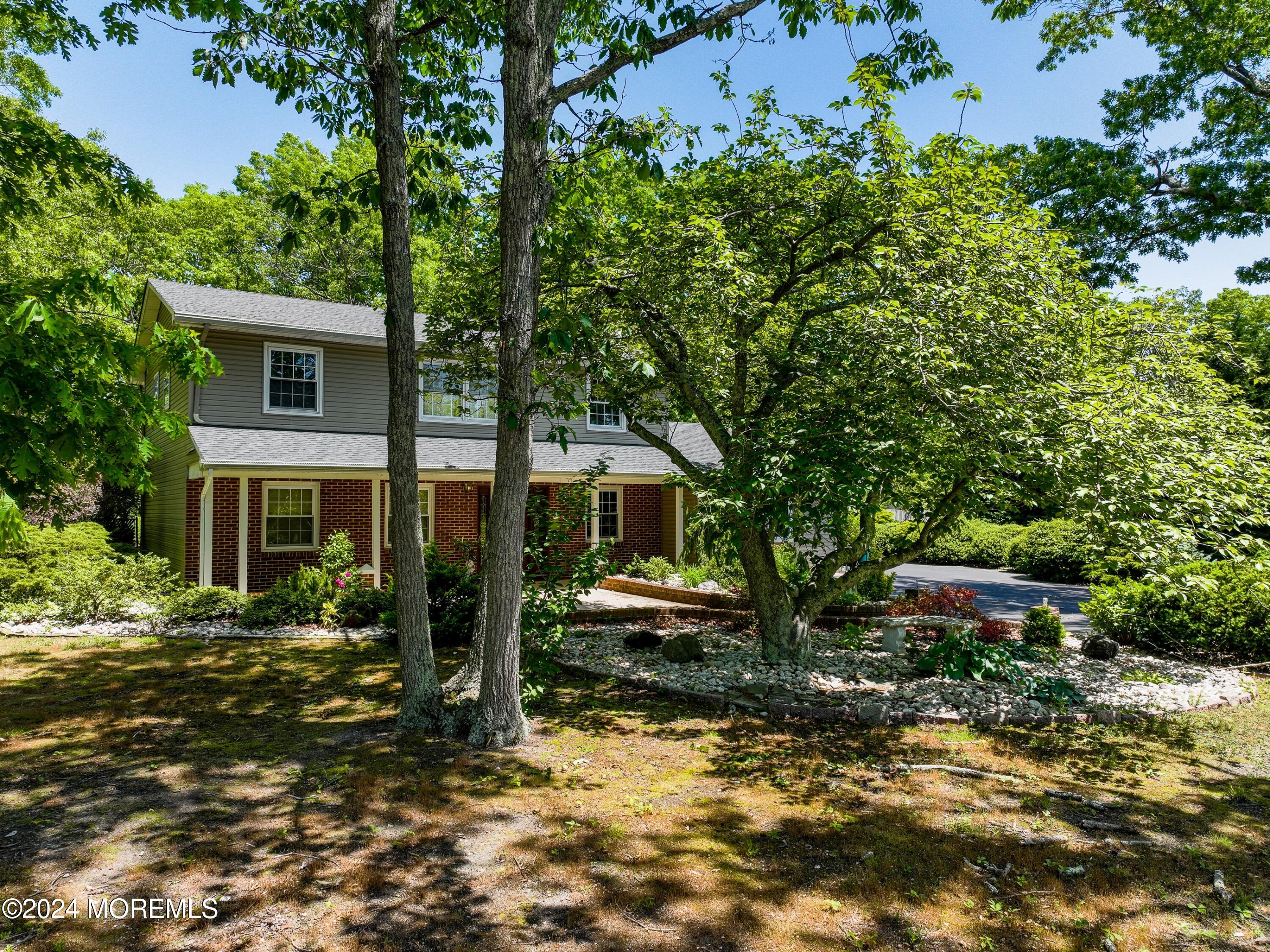 a front view of house with yard