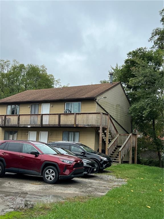 a car parked in front of a house