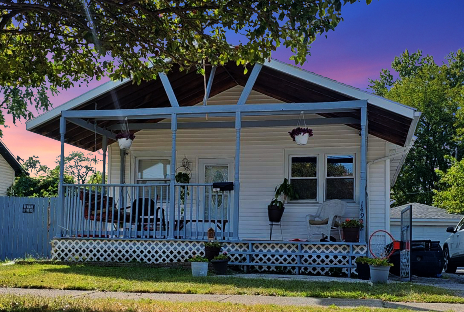 front view of a house with a yard