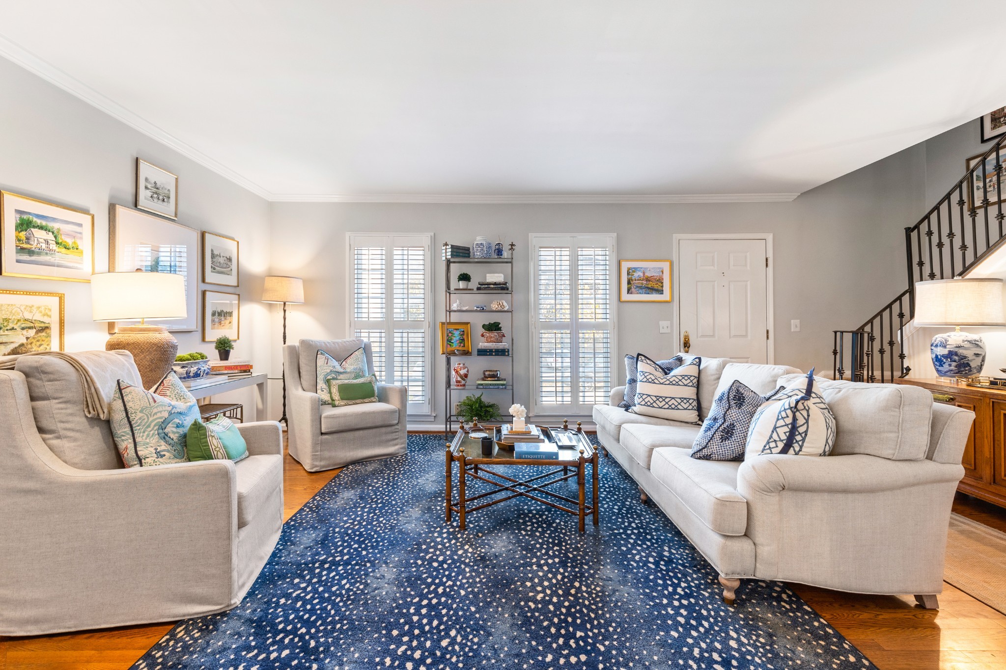 a living room with furniture and a couch