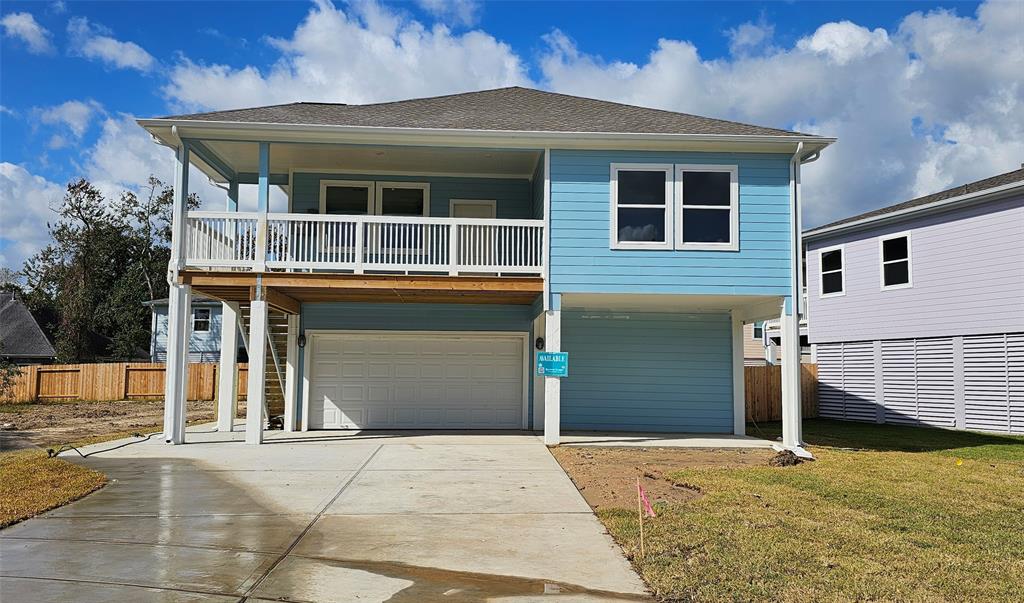 a front view of a house with a garage