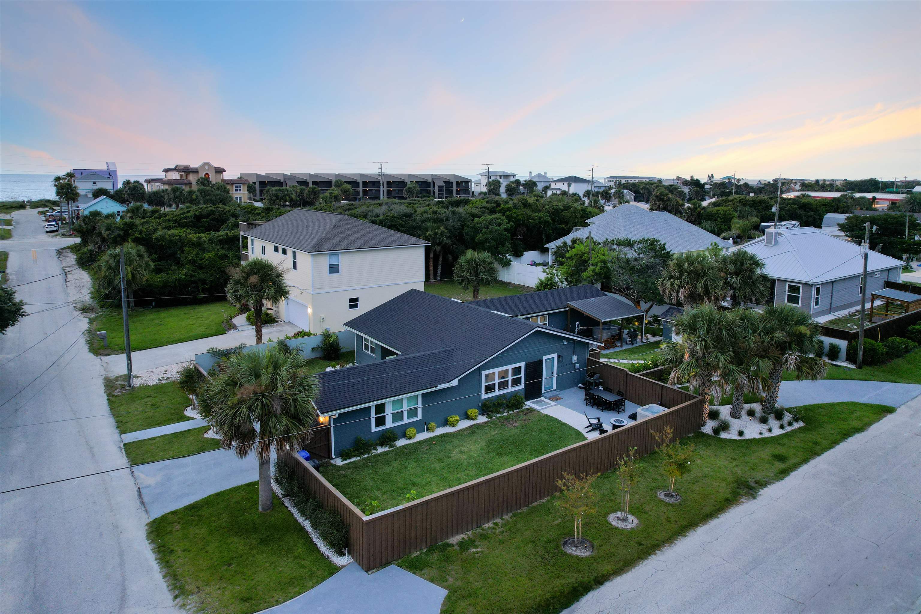 an aerial view of a house with a garden