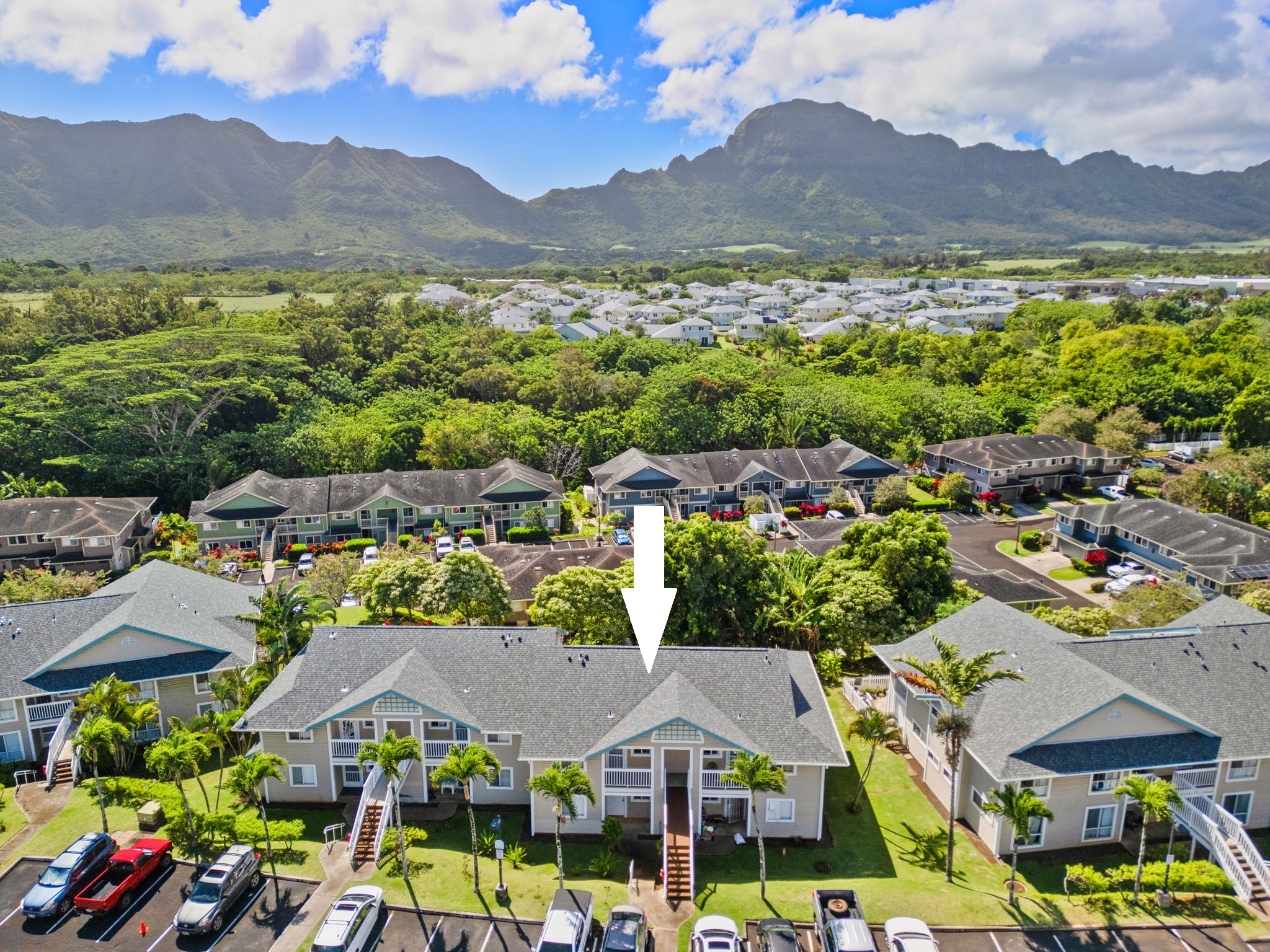 an aerial view of residential houses and outdoor space