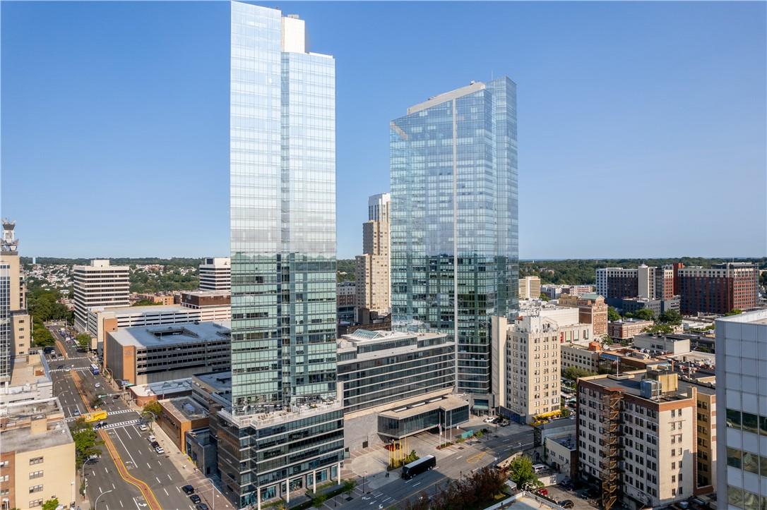 a view of city with tall buildings