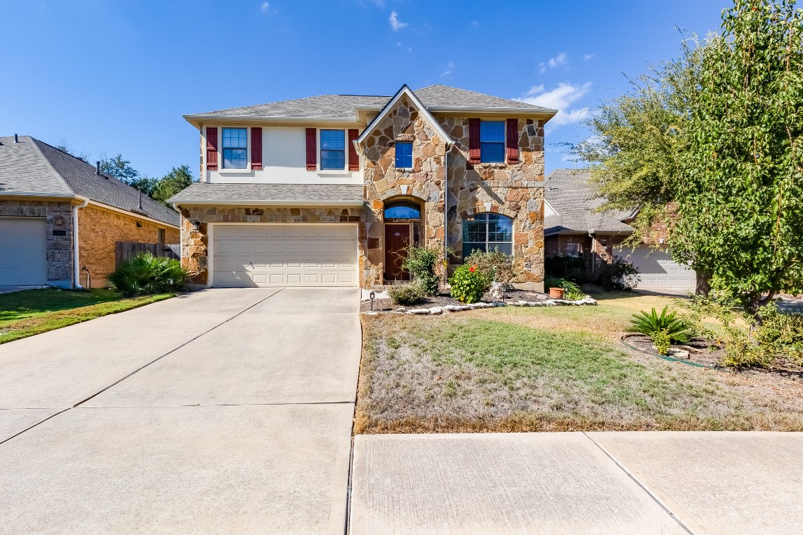 a front view of house with a yard