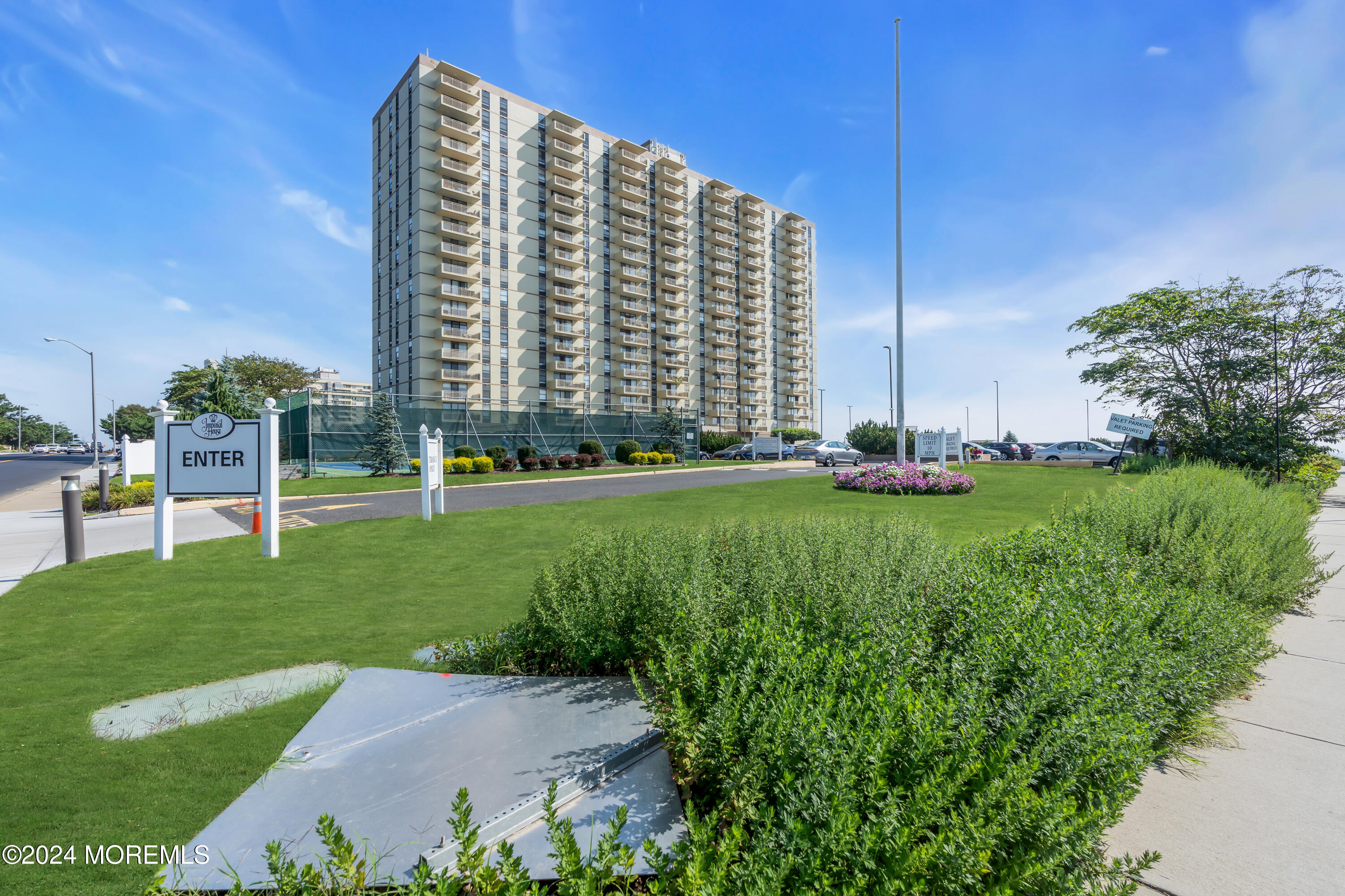 a view of an apartment with a garden