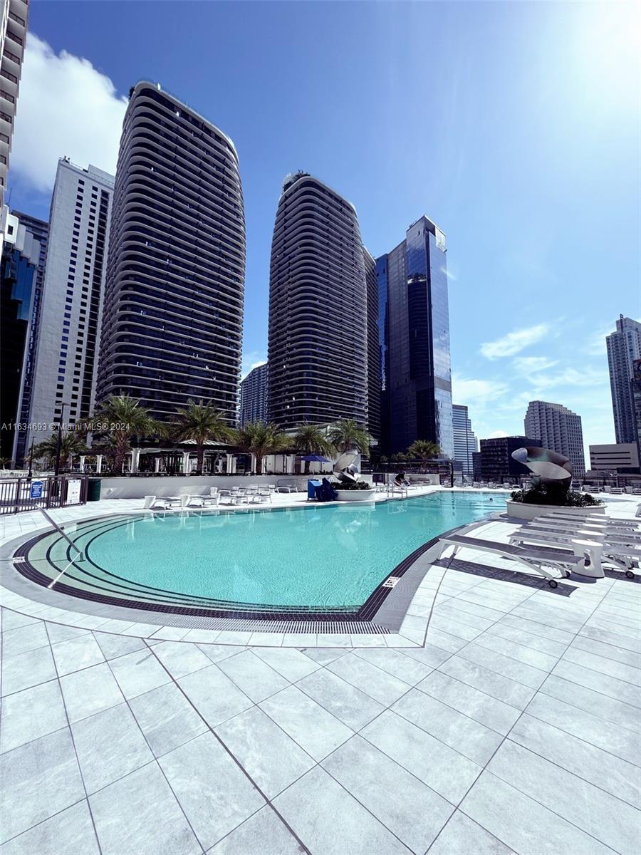 a view of a tall white building