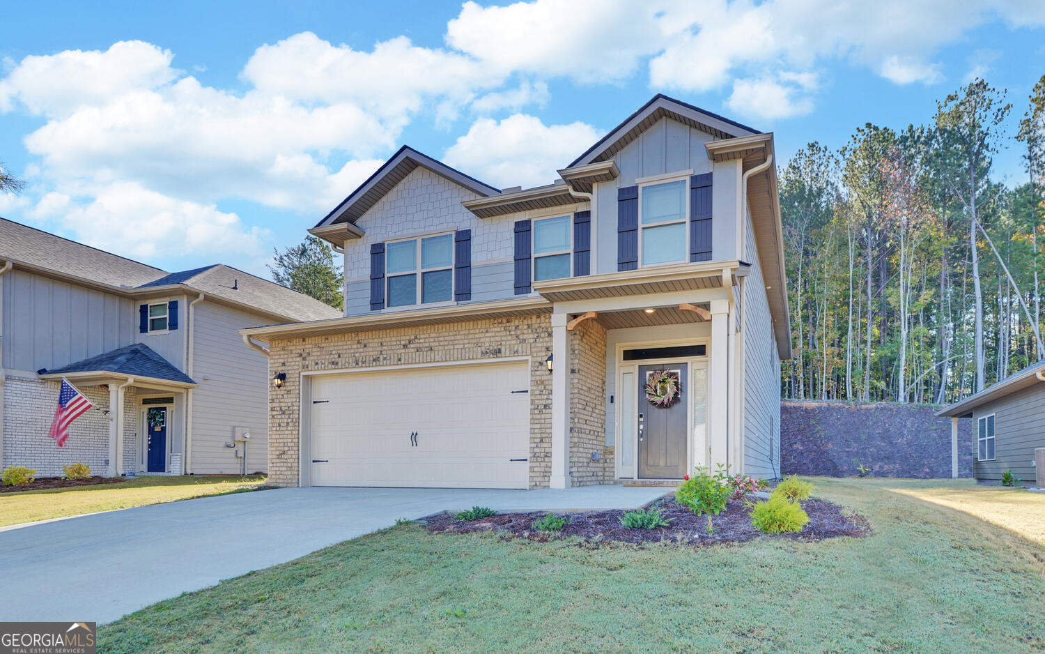 front view of a house with a yard