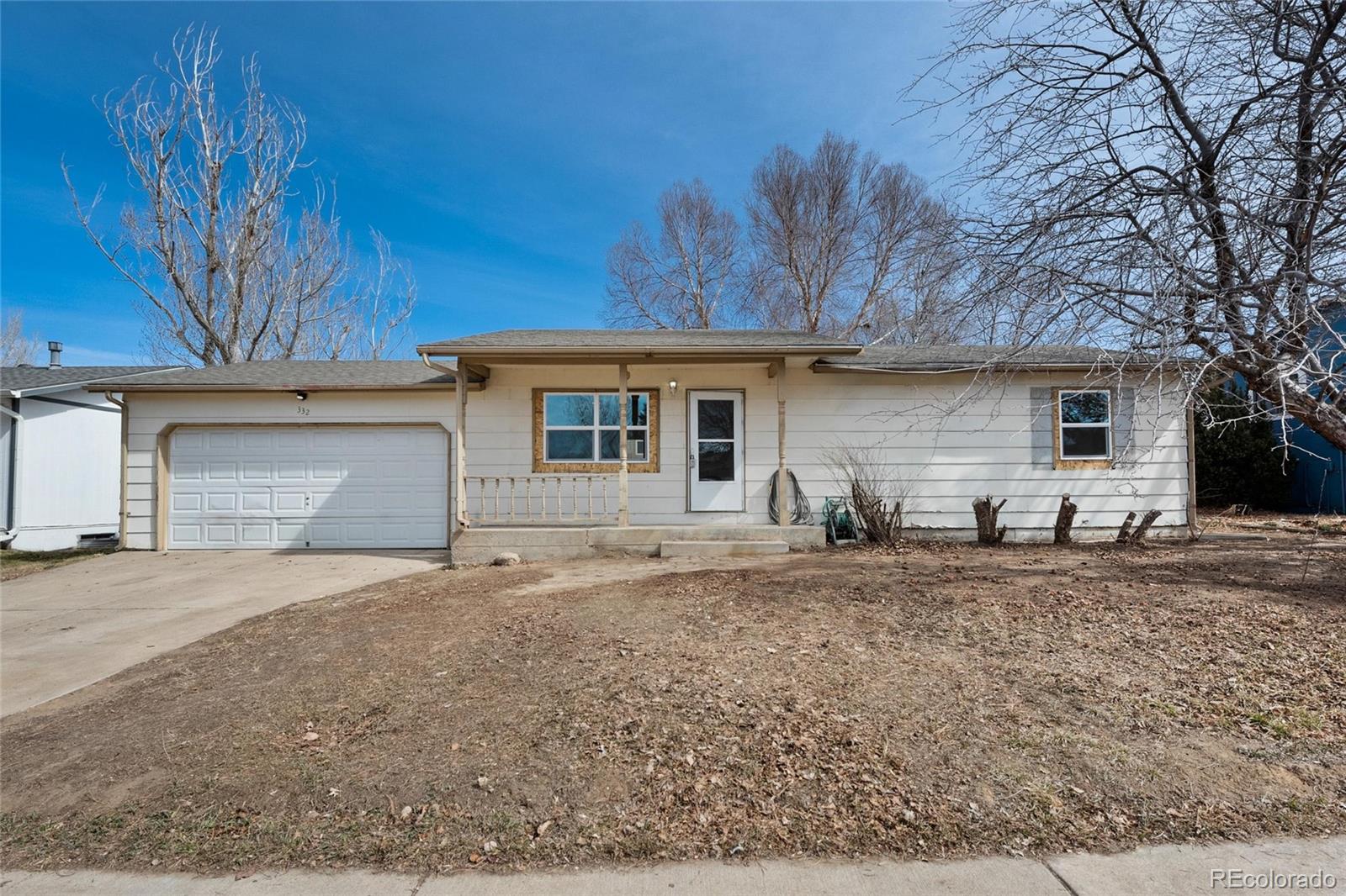 a house with trees in the background