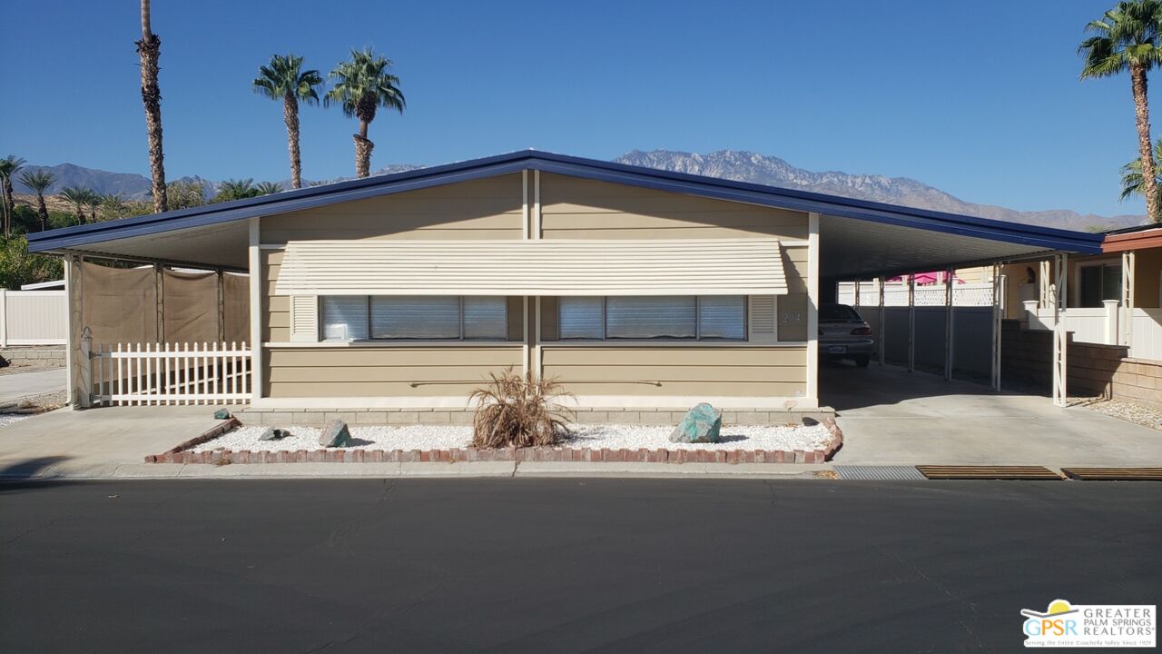 a front view of a house with street