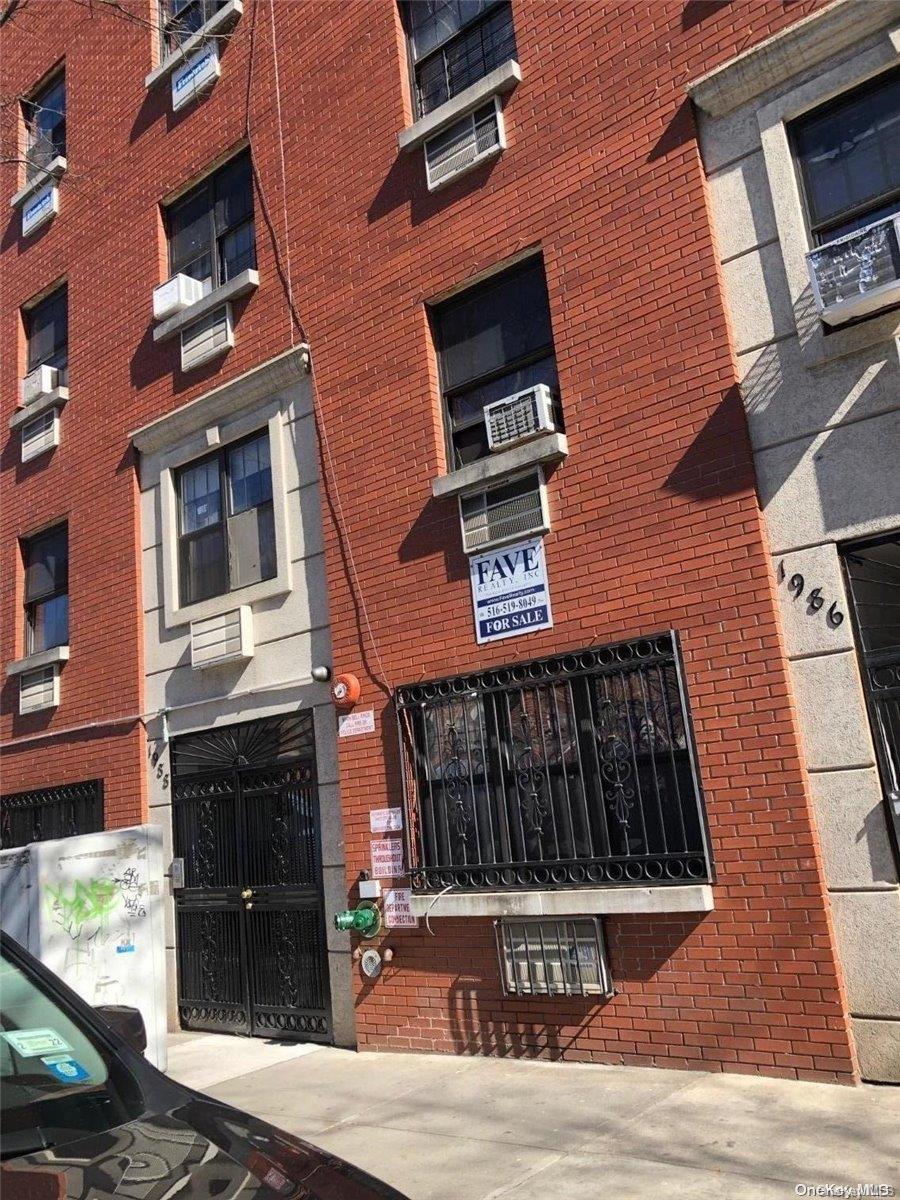 a street sign on a brick building