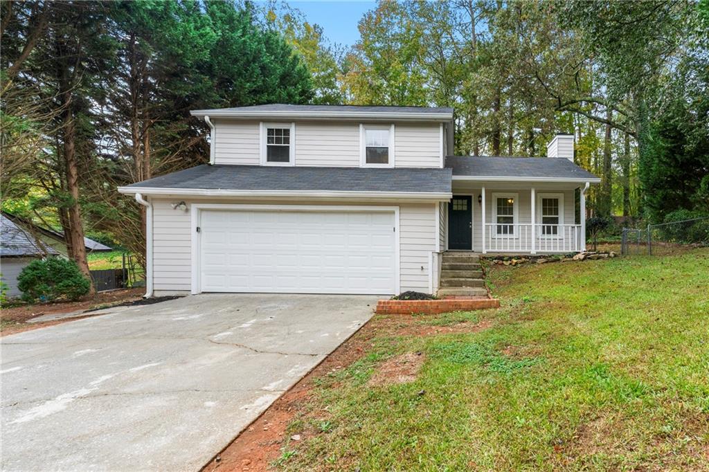 front view of a house with a yard