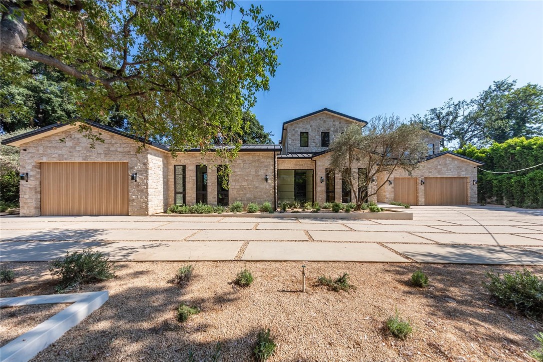 front view of a house with a dry yard