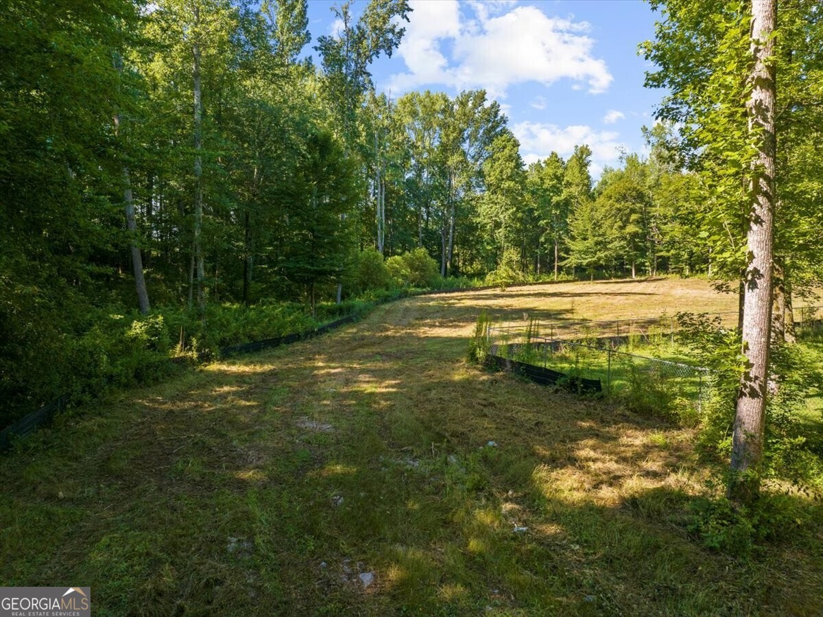 a view of a lake view with a big yard