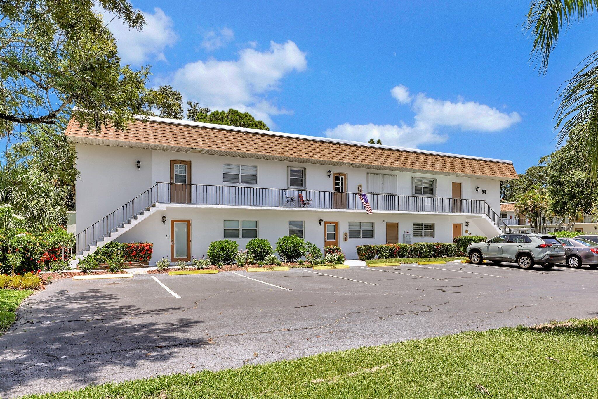 a front view of a building with street view