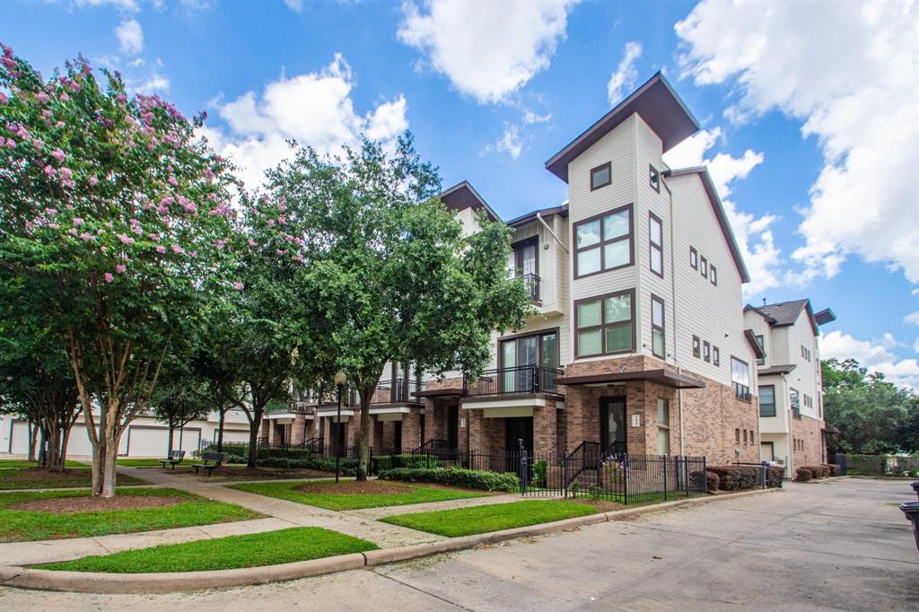 Welcome home to this wonderful 3x3 unit with balcony, yard, and corner unit.