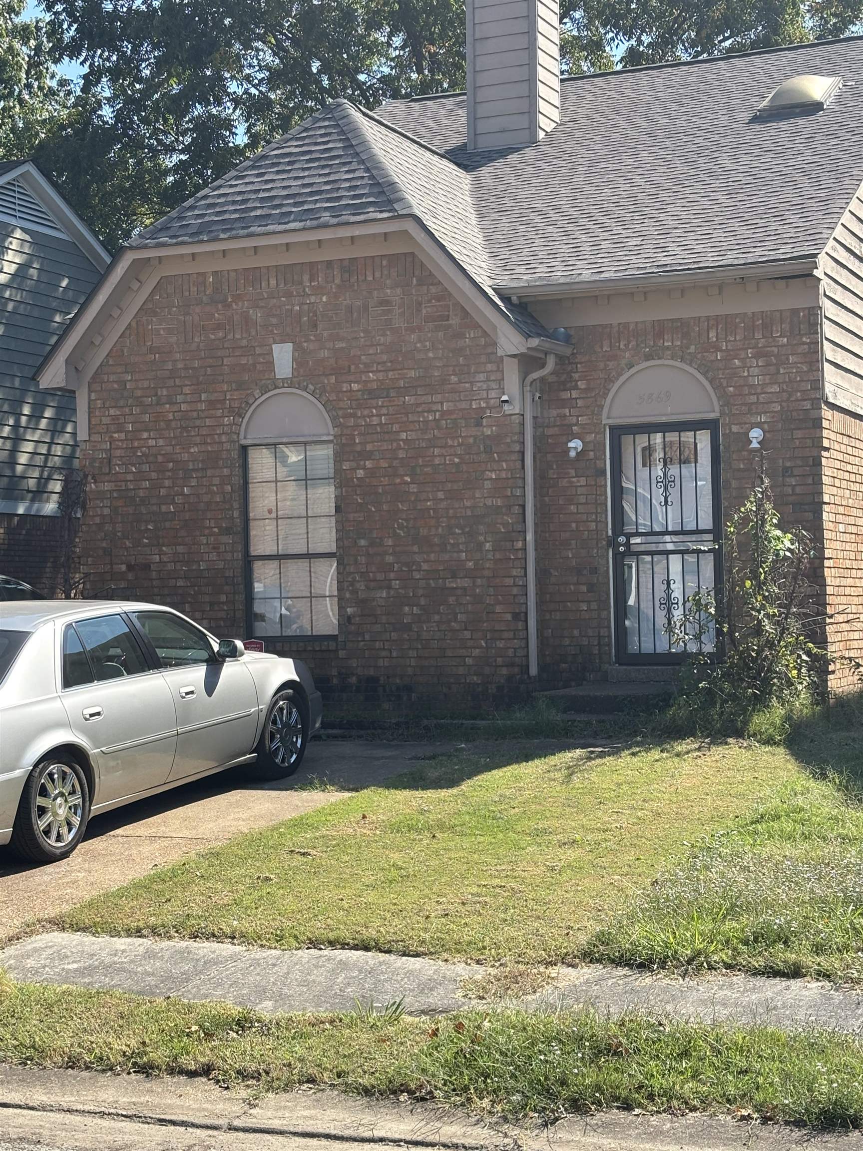 Exterior space featuring a front lawn