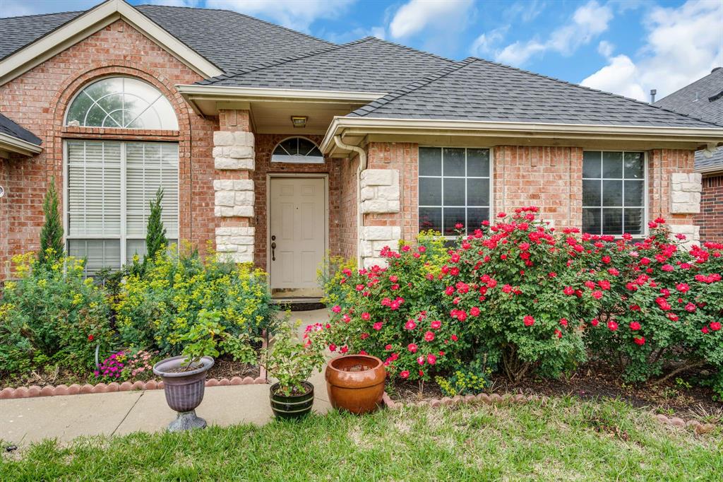 a front view of a house having yard